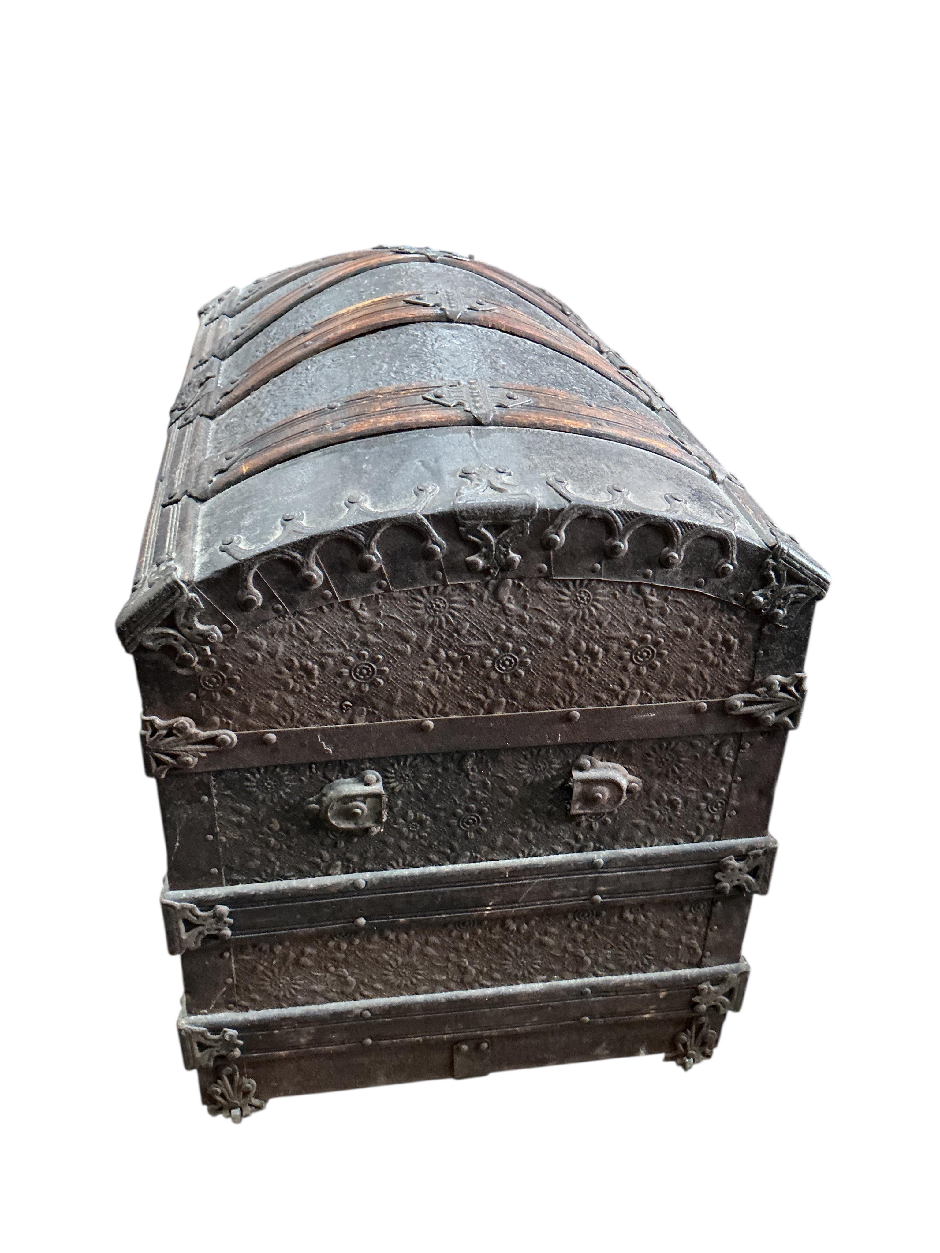 A Victorian metal mounted wood bound domed trunk, width 75cm, depth 46cm, height 54cm